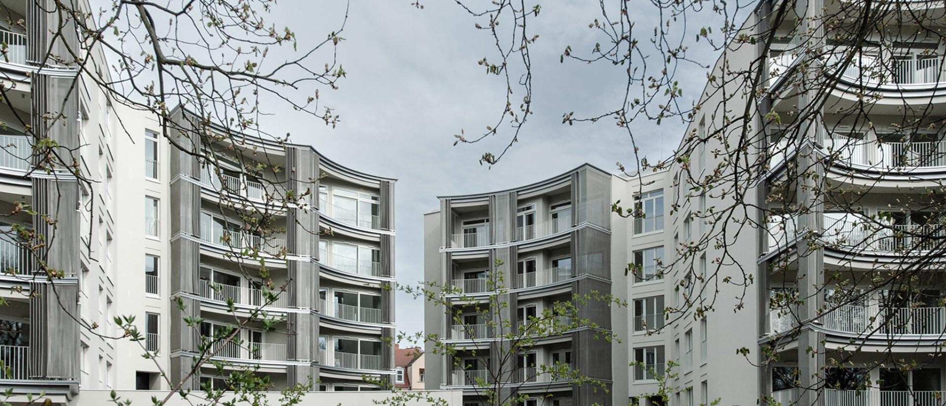 scalloped facade shapes polands perfumiarnia apartments by jems architekci - 17032